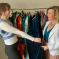 Kristy Adams and shopper looking through clothes